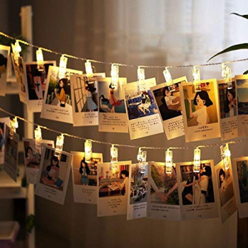 Varal com fotos polaroid